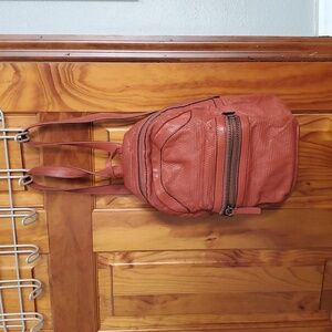 Frye burnt orange mesh pattern leather backpack with front zip pocket